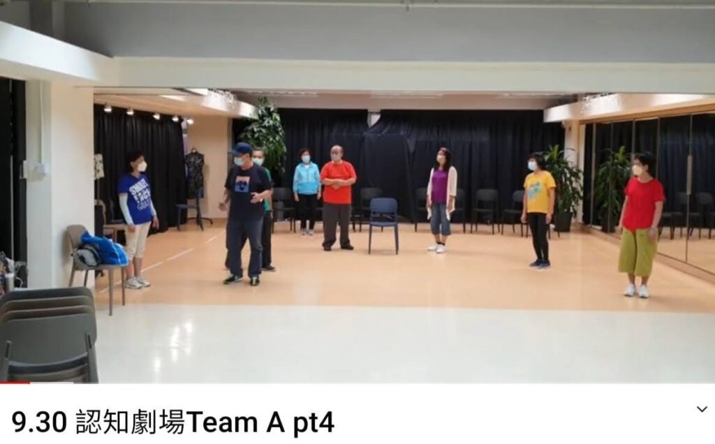 在燈火通明的舞台背後，有一位導演默默耕耘多年，不為掌聲，只為讓每個人都找到屬於自己的聲音。他是梁日田，一位將戲劇視為生命教育工具的資深導演。在香港這座節奏急促的城市中，他選擇放慢腳步，走入社區，走近長者與青少年，用戲劇連結彼此的故事情感，讓人重新看見生活的厚度與溫度。